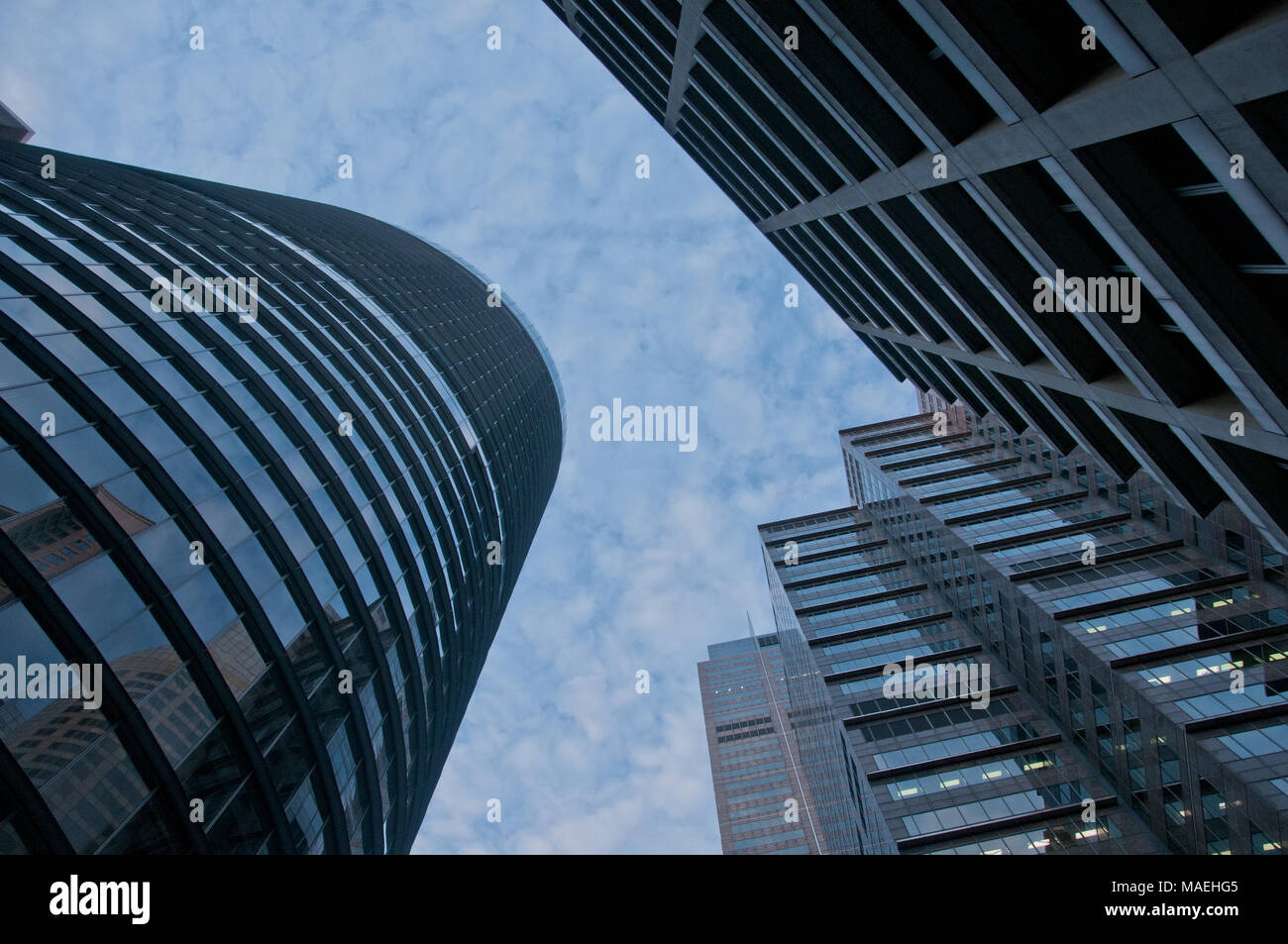 Look up on high sky and modern corporate office buildings Stock Photo