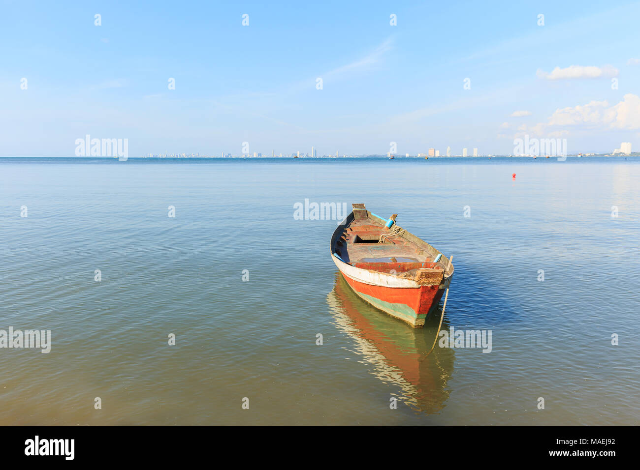 old wood fishing boat at anchor in sea Stock Photo - Alamy