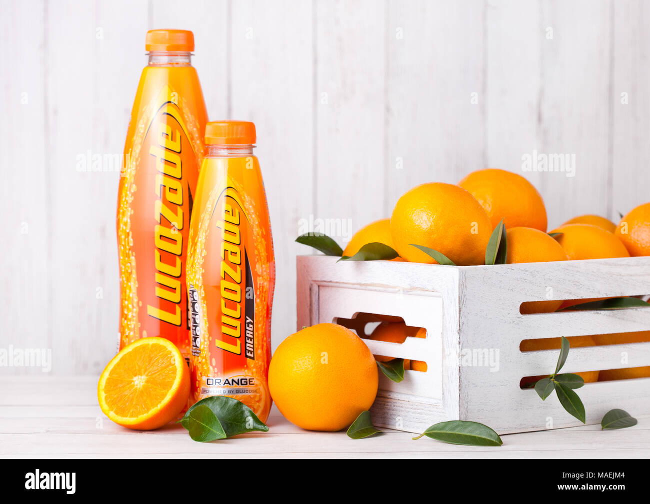Orange plastic bottle fresh juice hi-res stock photography and