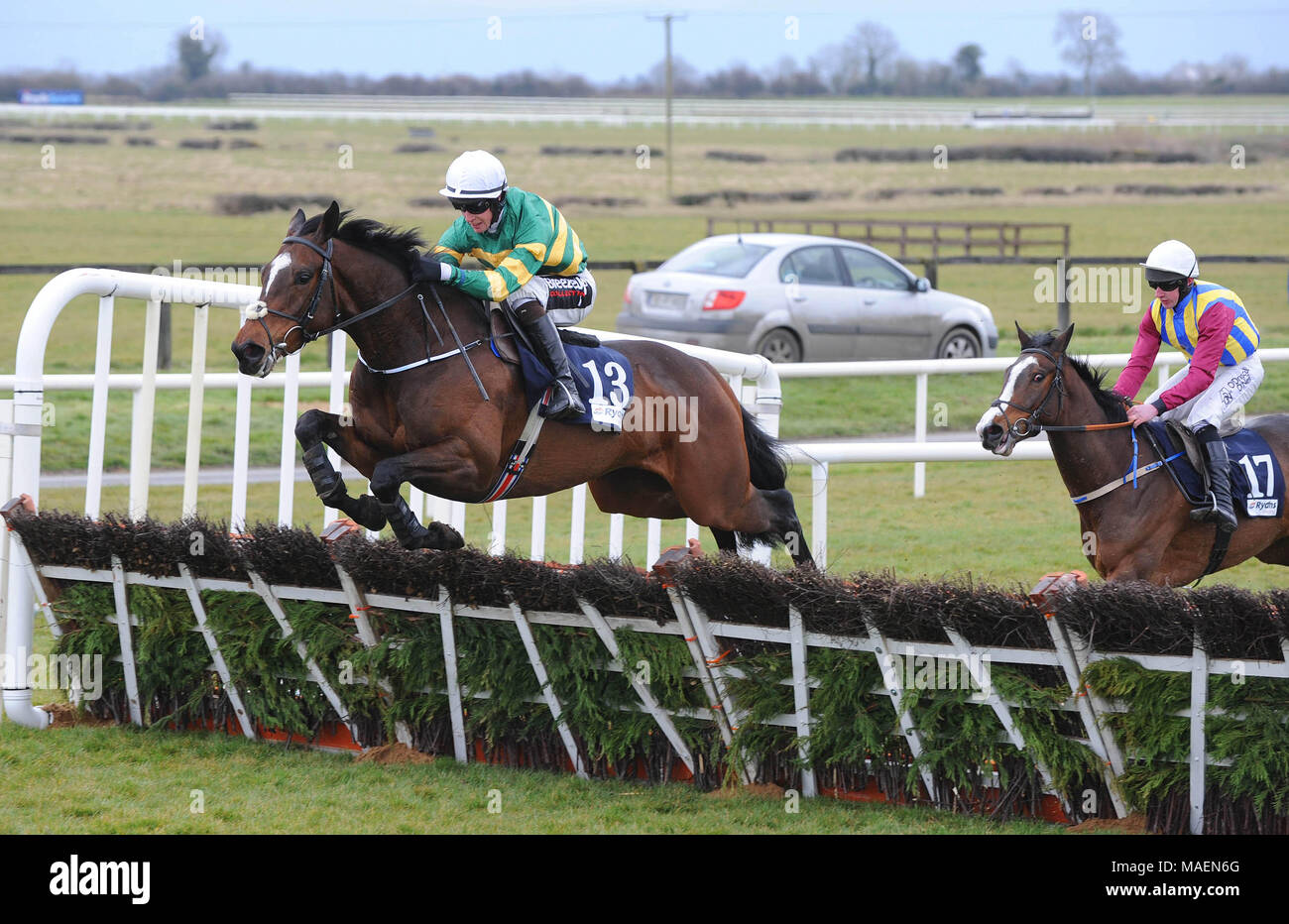 Uisce Betha ridden by JJ Slevin clears the last hurdle to win the Ryans Cleaning Event Specialists Maiden Hurdle during Ryan Air Gold Cup Day of the 2018 Easter Festival at Fairyhouse Racecourse, Ratoath, Co. Meath. Stock Photo