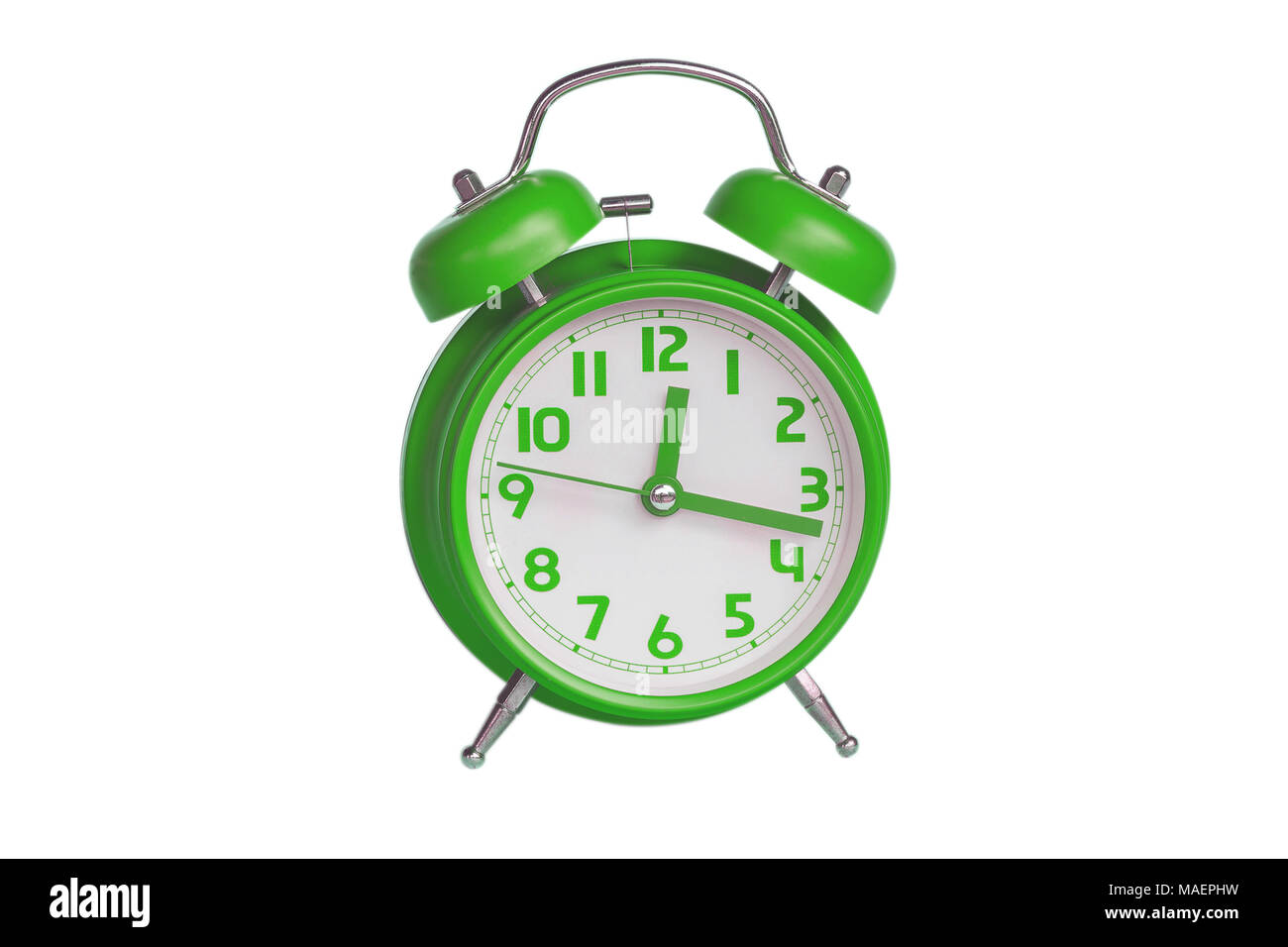 Green retro alarm clock on white background Stock Photo - Alamy