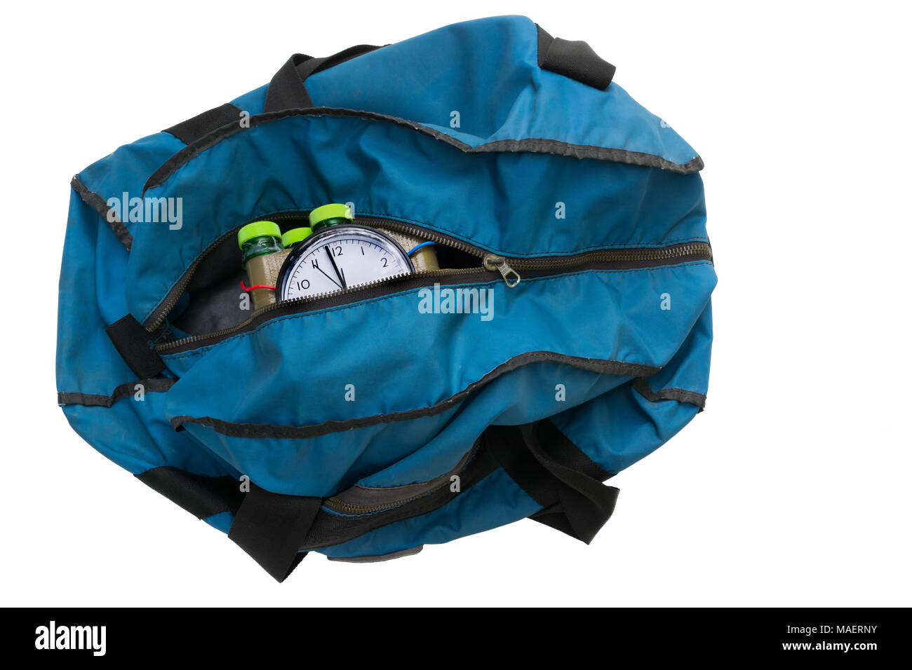 Time bomb inside blue bag. Isolated on white background. Imitation of the explosive device. Idea