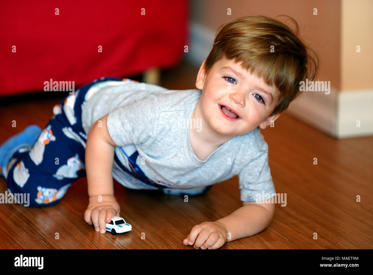 Montreal,Canada,8,August,2017.Young 2-year old boy on the floor looking at camera.Credit:Mario Beauregard/Alamy Live News Stock Photo