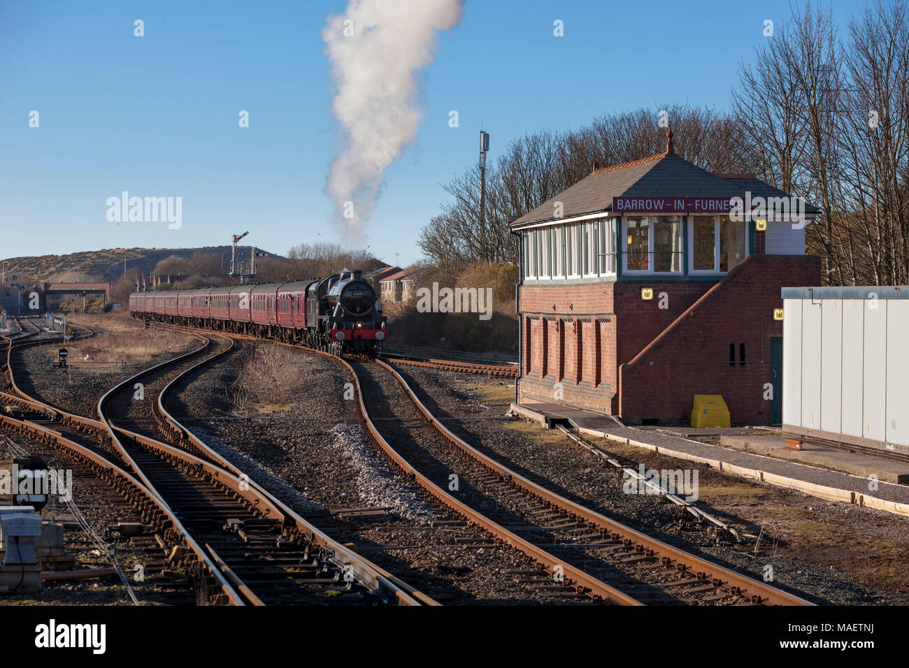 LMS Steam locomotive 45690 Leander with a Carlisle - Euston 'Cumbrian Coast Express' operated by West Coast Railways  at Barrow In Furness Stock Photo