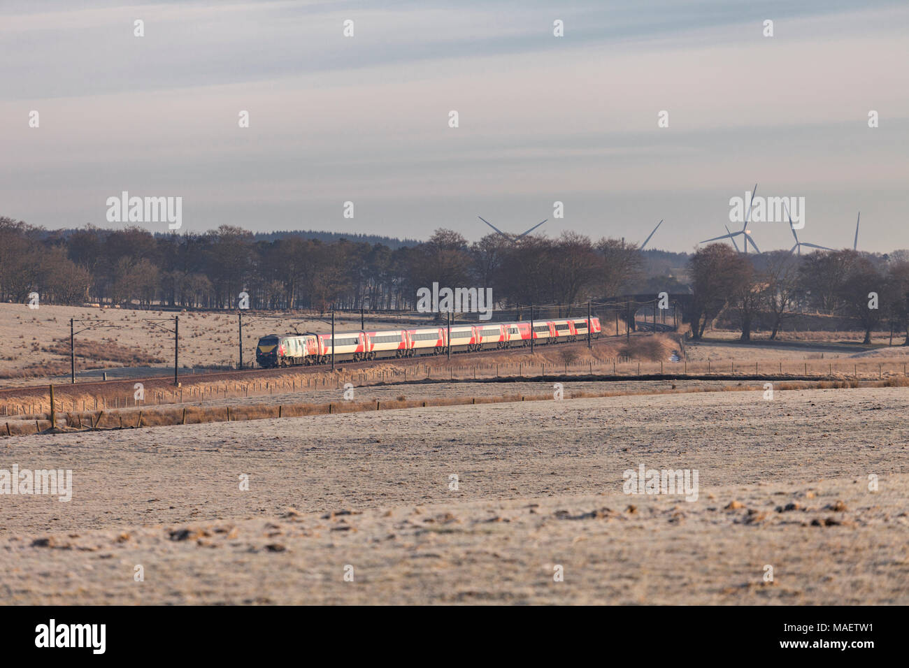 The one daily Glasgow to London Kings Cross Virgin trains east coast train passes  Auchengray (between Carstairs and Edinburgh) Stock Photo