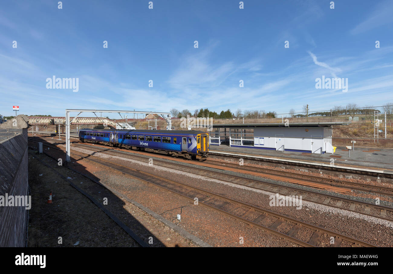 A Scotrail class 156 sprinter train calling at  Carstairs junction station, Scotland on the west coast main line Stock Photo