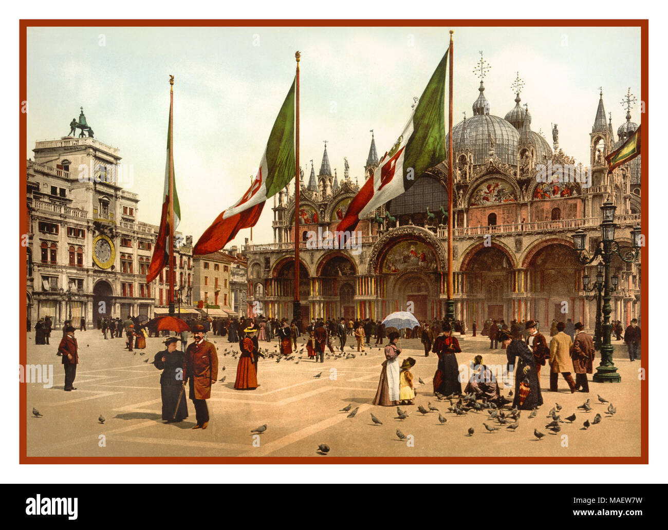 1890’s-1900 VINTAGE VENICE TOURISTS Photochrom Historic Vintage Old Venice St. Mark's Basilica Square Piazza Tourists 1890’s Fashion clothing style and the clock tower 1890-1900 Chromolithograph post colour photochrom printing technique Stock Photo