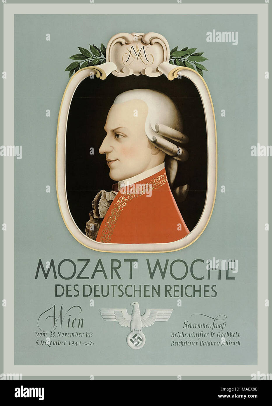 WW2 Nazi Vintage ‘Mozart Woche’ Music Performance Poster with Swastika  1941 Mozart Week of the German Reich. Vienna, Austria from 28 November to 5 December 1941; Patronage Minister of the Reich Dr. Goebbels, Reichsleiter Baldur v. Schirach  Third Reich promoted Mozart's music to further the ambitions of the Nazi regime Stock Photo