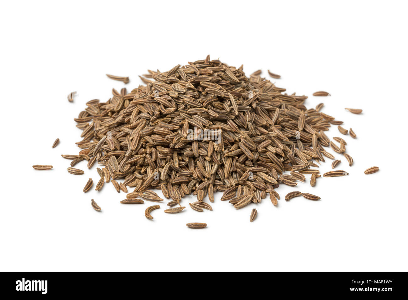 Heap of Caraway seeds isolated on white background Stock Photo