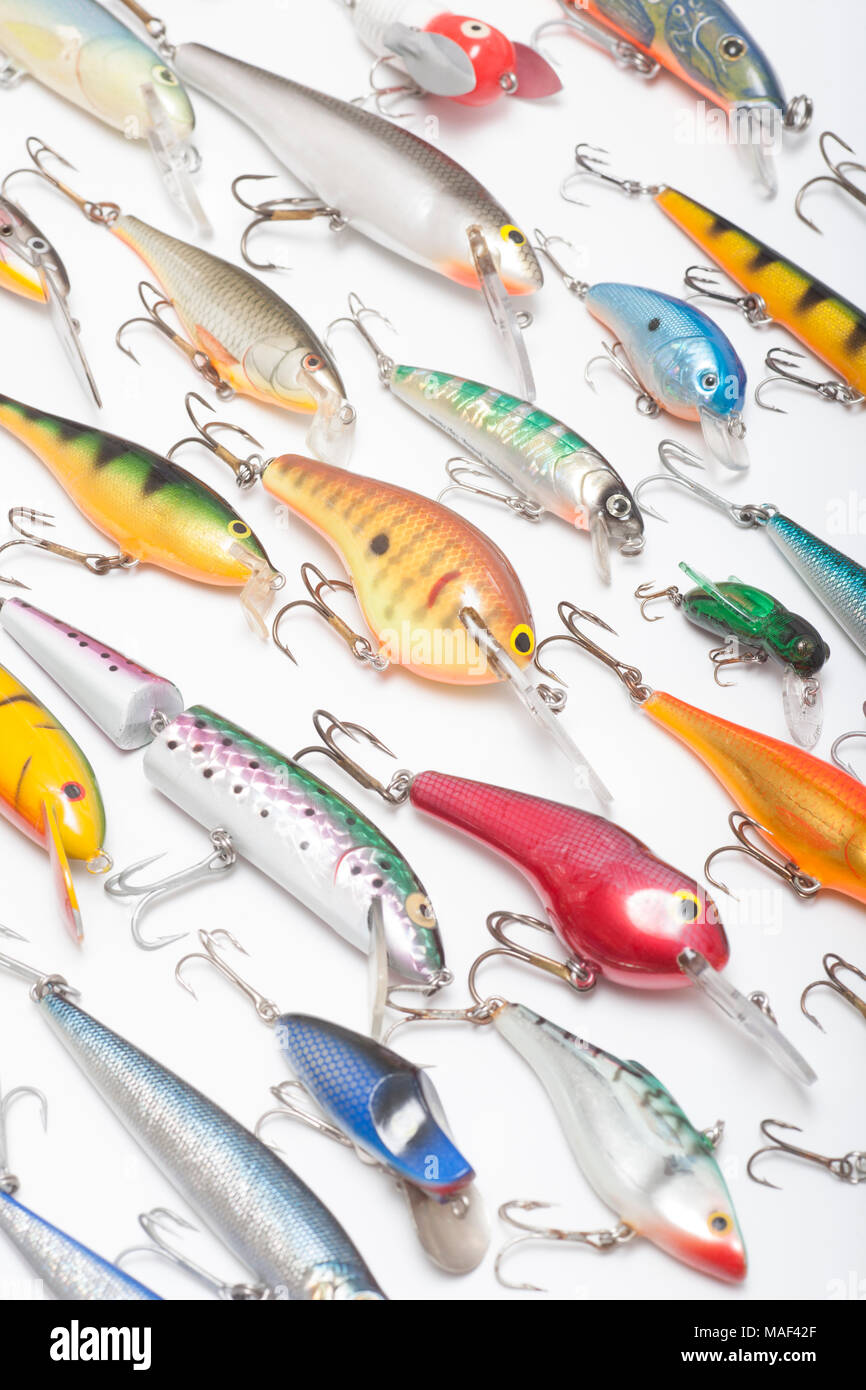 A collection of modern fishing lures also known as plugs for catching predatory fish on a white background. UK Stock Photo
