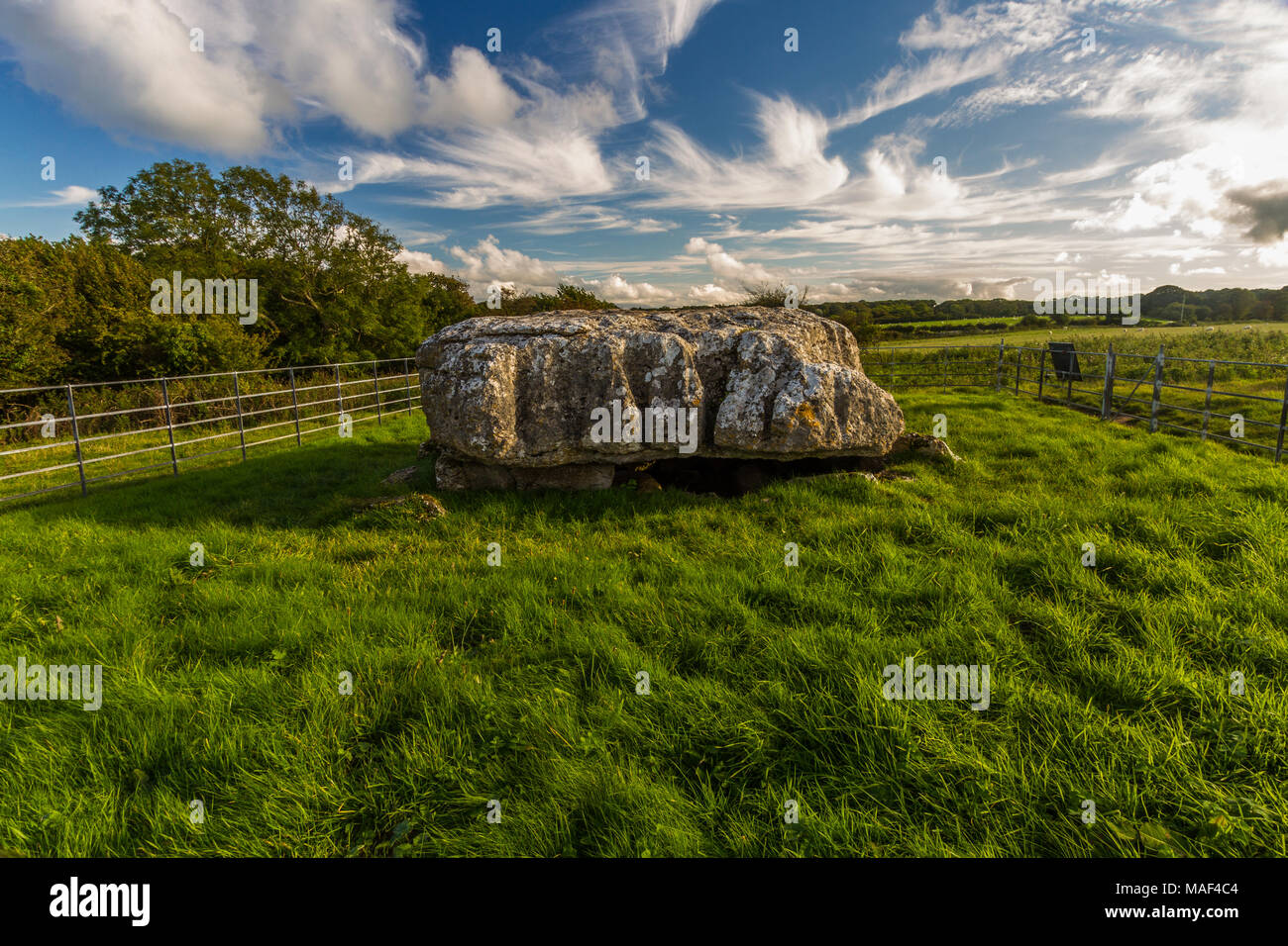 Lligwy Cromlech in evening light. Moelfre, Anglesey, United Kingdom. Stock Photo