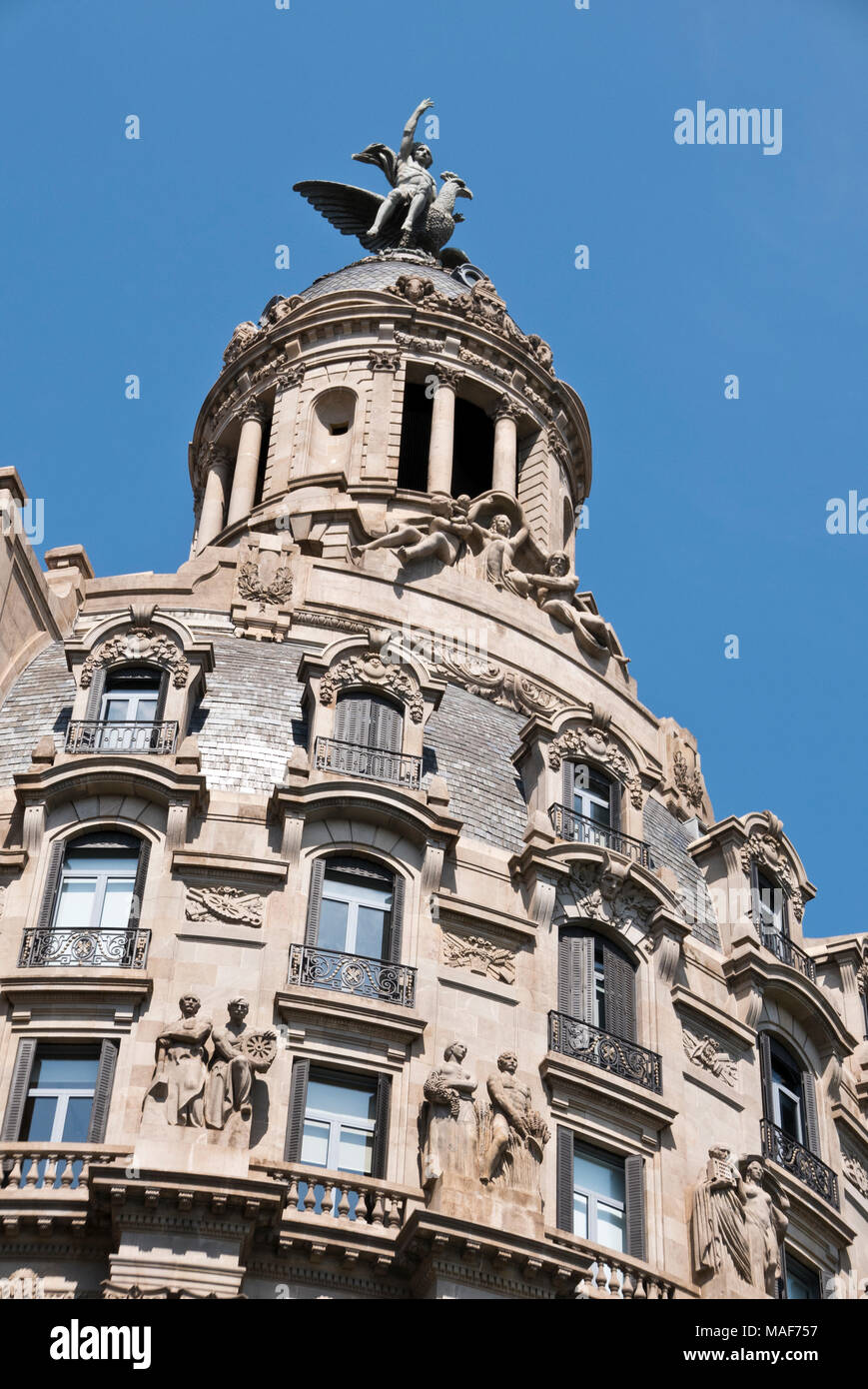 A building decorated with classical statues in Barcelona, Spain Stock