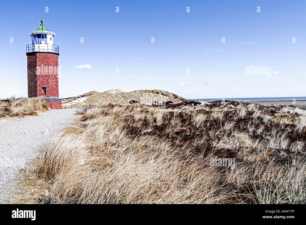Dunes and lighthouse on the island of Sylt (Germany): Dünen und Leuchtturm (Kampen) auf Sylt Stock Photo