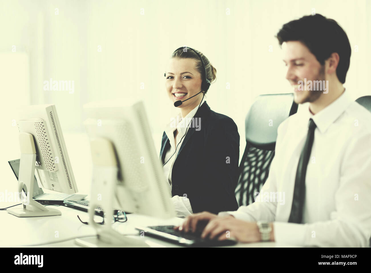 Business People Group With Headphones Giving Support In Help Desk