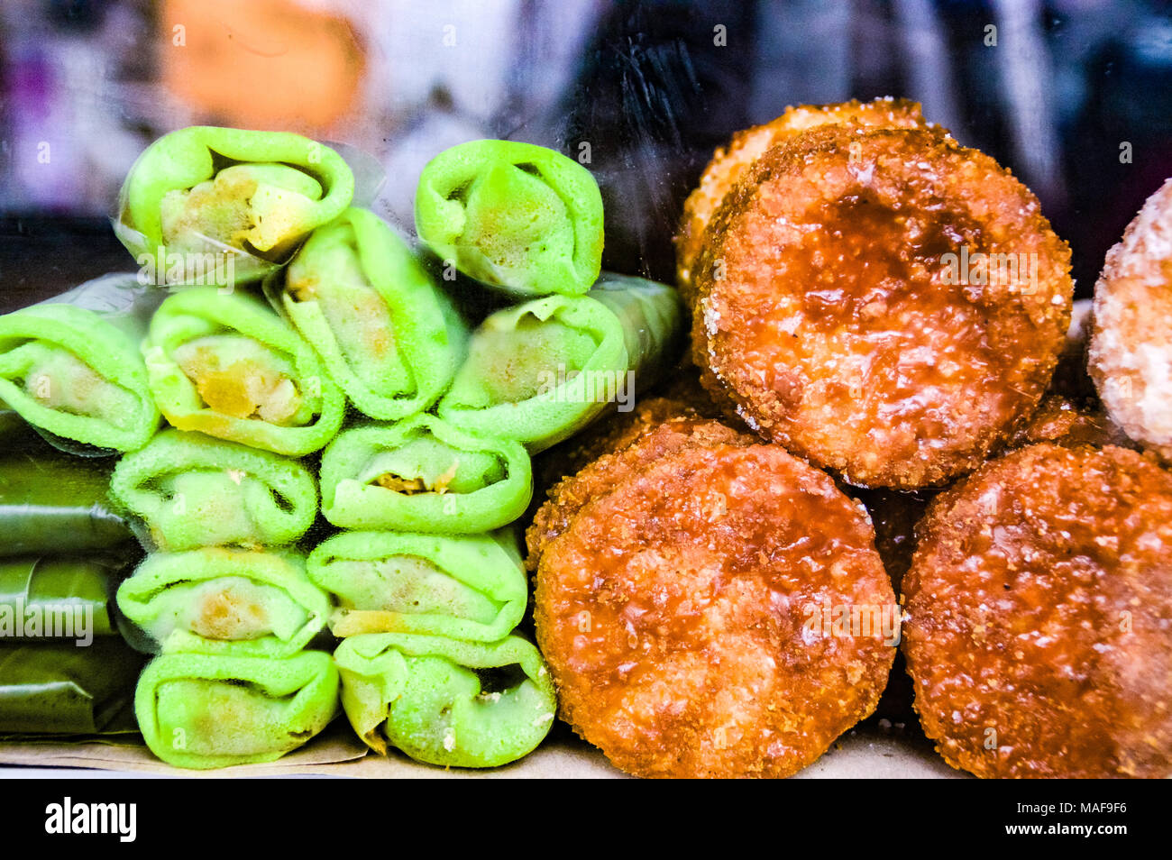 Delicious Indonesian sweet snacks sold on little stalls along the streets of Medan City in Indonesia Stock Photo