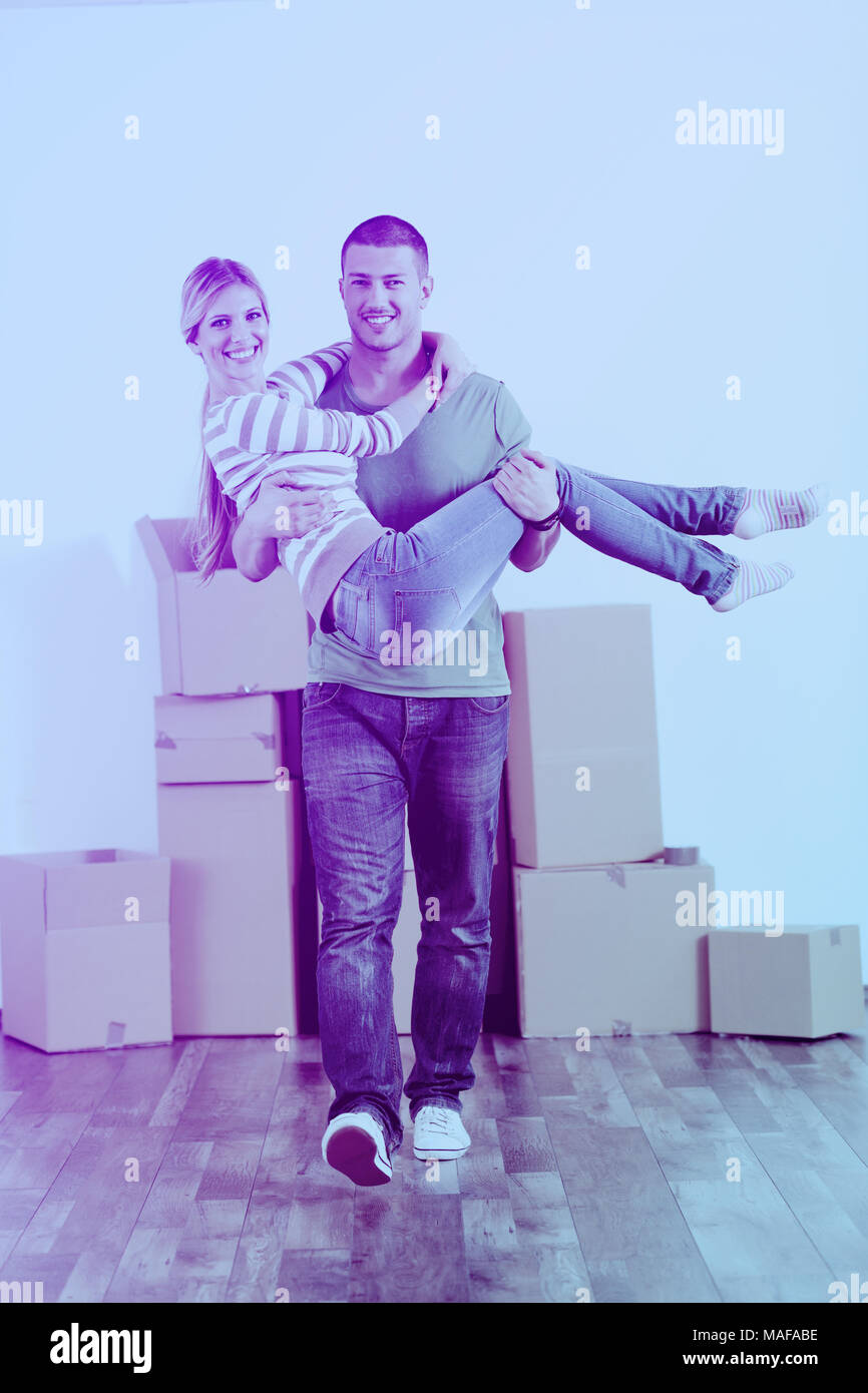 happy Young couple moving in new house Stock Photo - Alamy