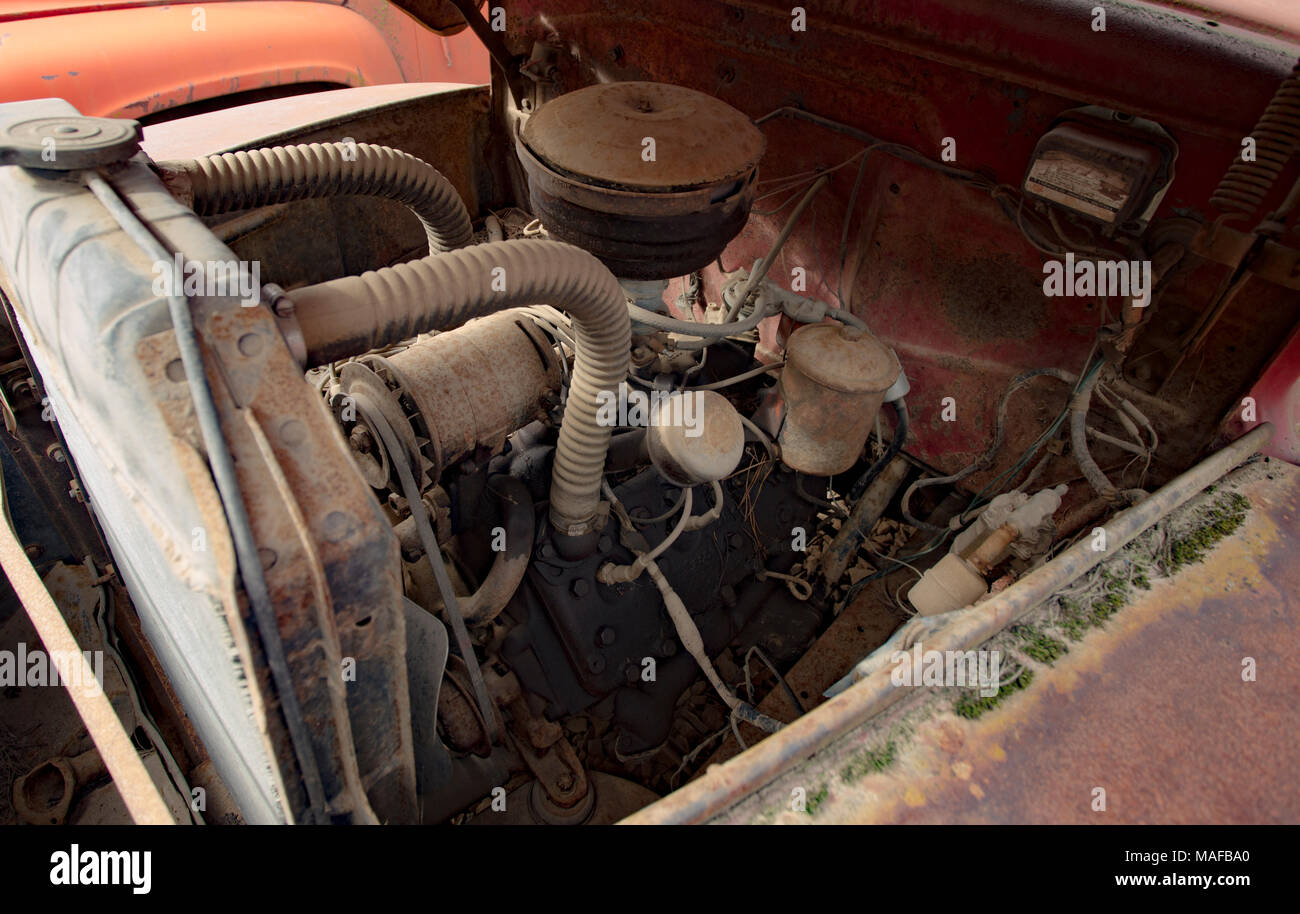 A 239 CID Ford Flathead V8 engine in an old 1948 Ford F-5 truck, in a stone quarry, east of Clark Fork Idaho. Stock Photo