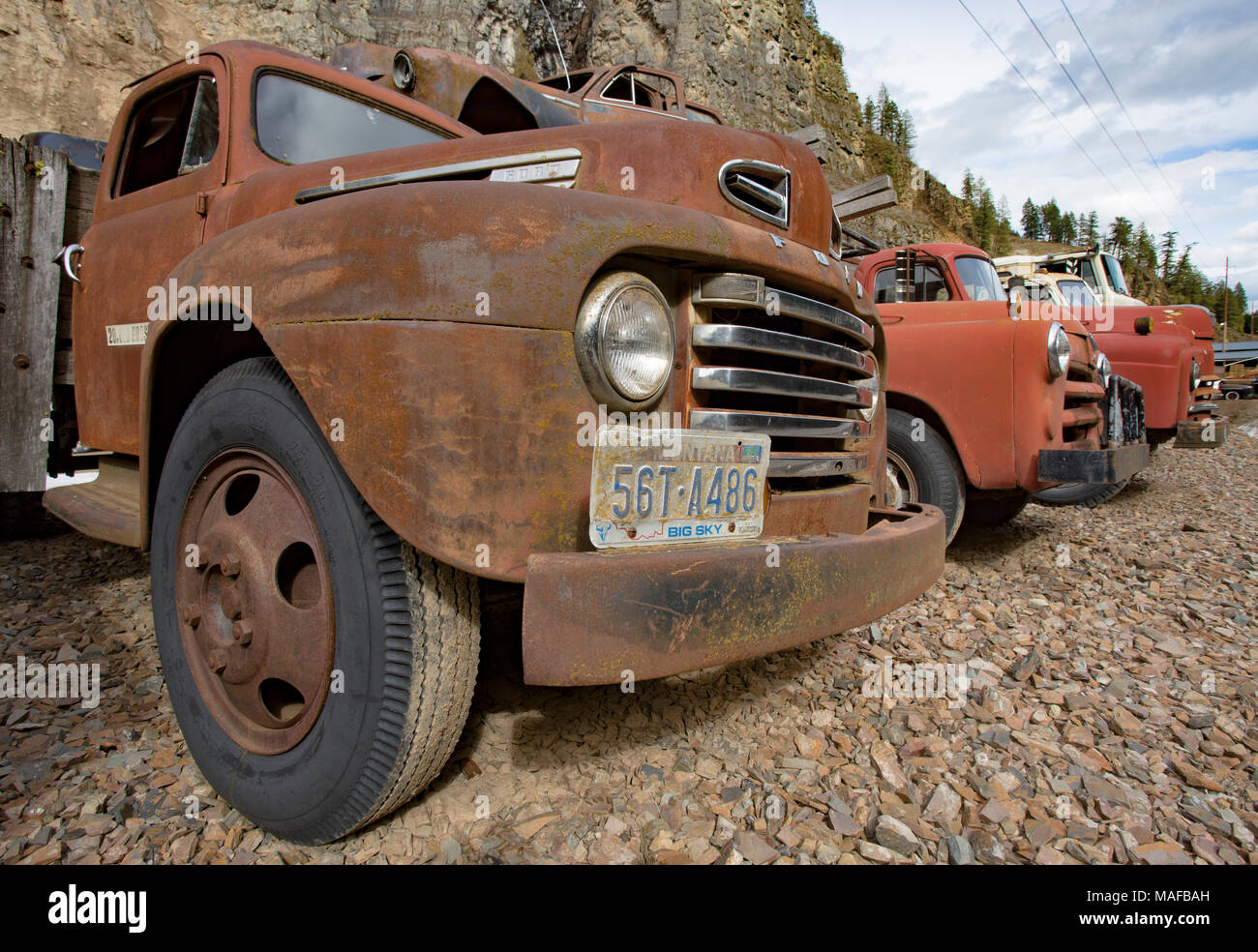 An old 1948 Ford F-5 F5 flatbed, stake body truck, in a stone quarry, east of Clark Fork Idaho. Stock Photo