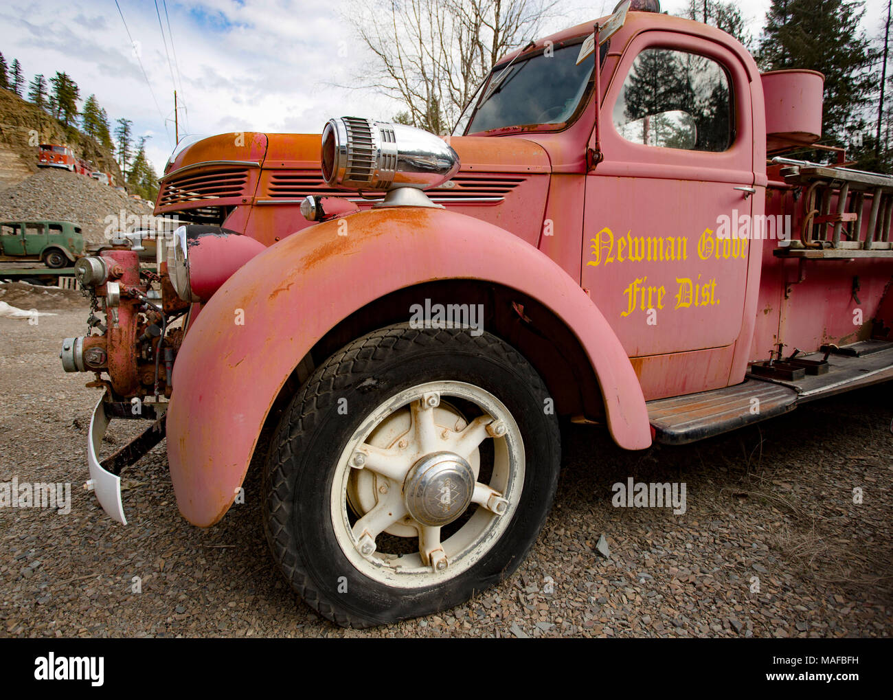 An antique Newmans Grove Fire District 1937 International D Series fire truck, in an old stone quarry, east of Clark Fork Idaho. Stock Photo