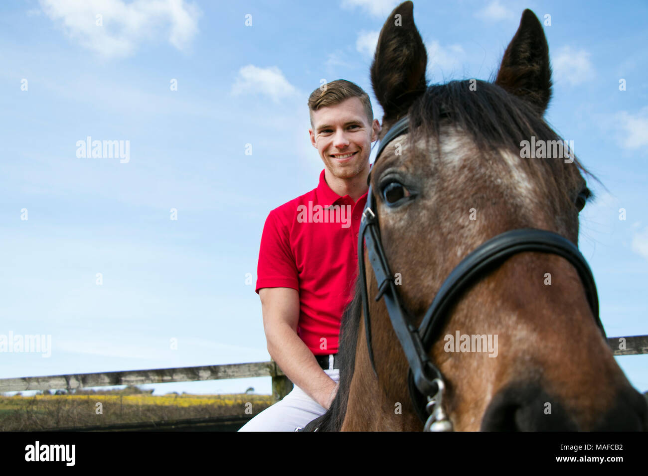 red polo shirt with blue horse