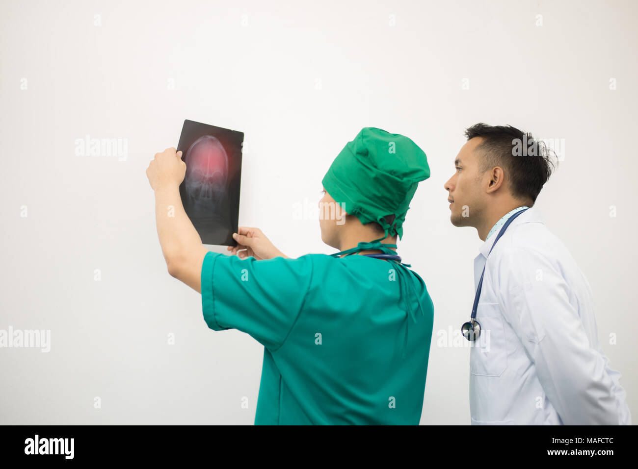 Doctor holding chest x-ray film of patient at hospital Stock Photo - Alamy