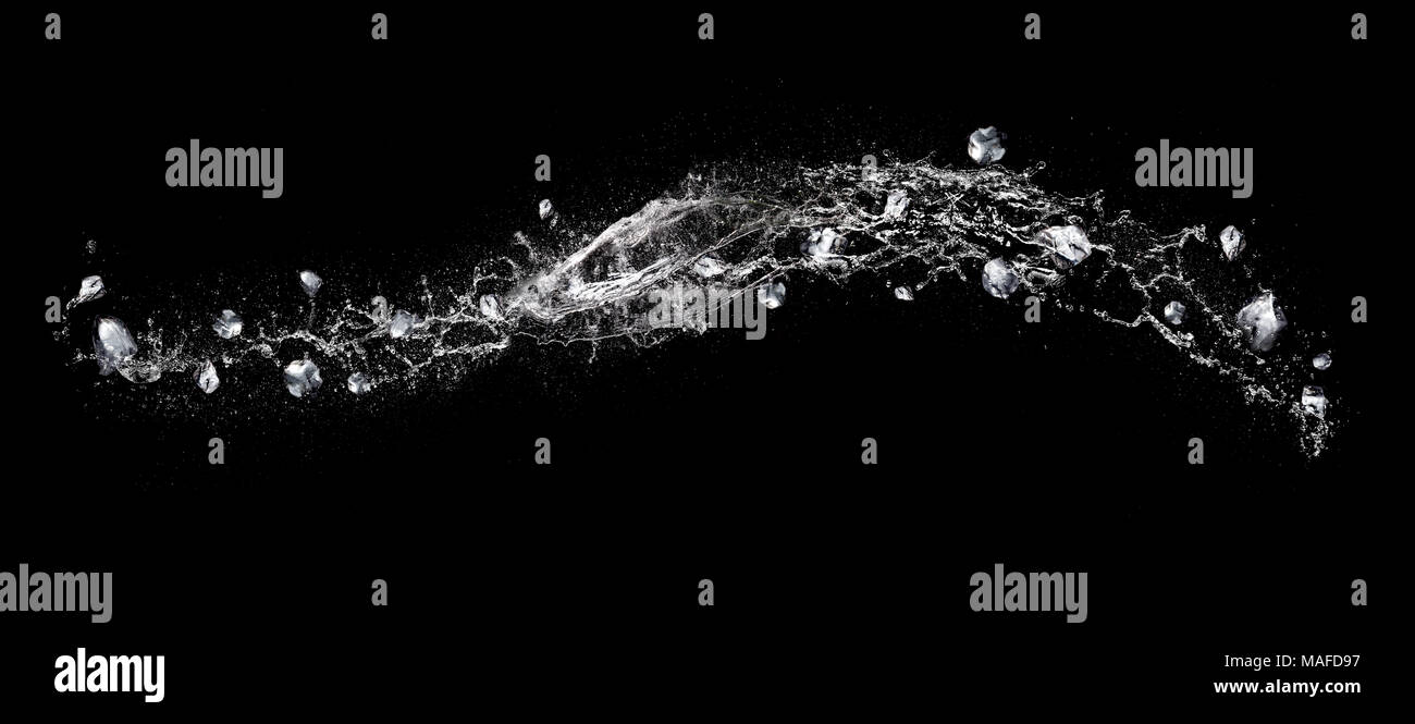 Water splash abstract shape with ice cubes isolated on black background ...