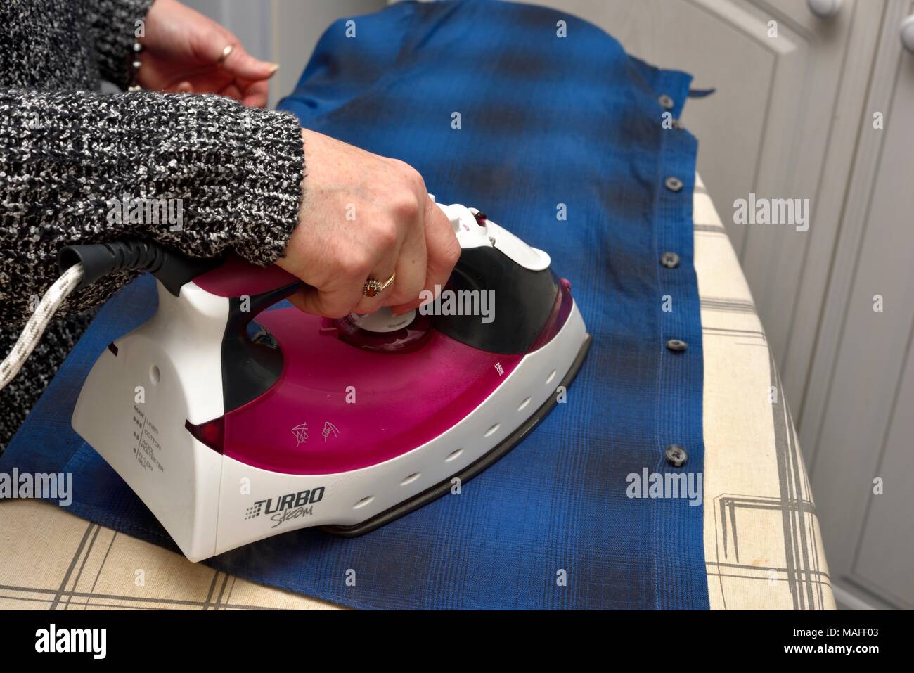 Ironing board electric iron hi-res stock photography and images - Alamy