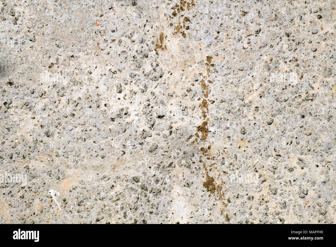 Concrete surface with well-seen small pebbles Stock Photo