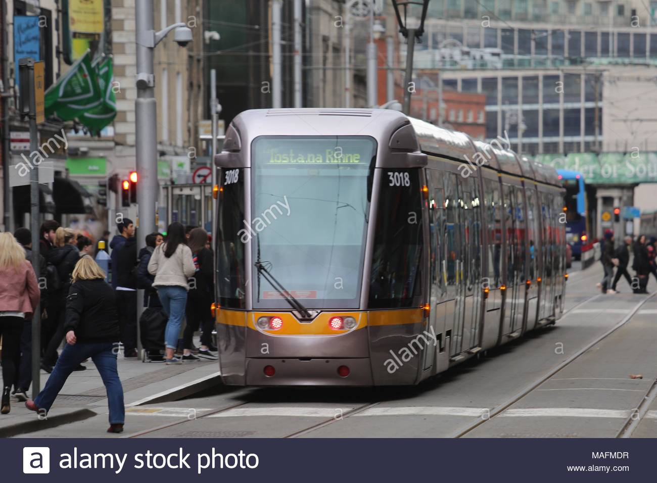 A Luas tram in downtown Dublin as the city expands its commuter links and introduces a modern transport system befitting  a European capital. Stock Photo