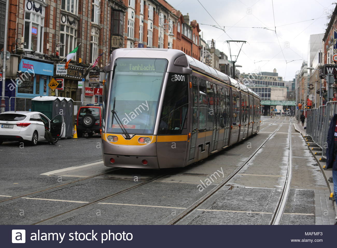 A Luas tram in inner Dublin, Ireland at a time when the Luas system has been rapidly developed and is being used by many commuters in the capital city Stock Photo