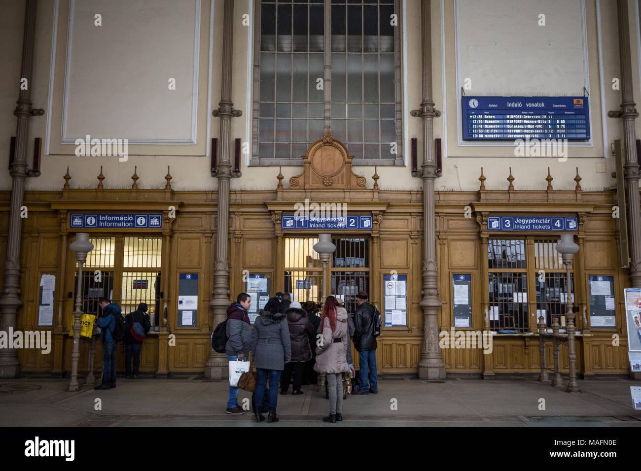 BUDAPEST, HUNGARY - DECEMBER 18, 2016: People queuing and waiting in front  of ticket counters in Nyugati Palyaudvar train station to buy train tickets  Stock Photo - Alamy