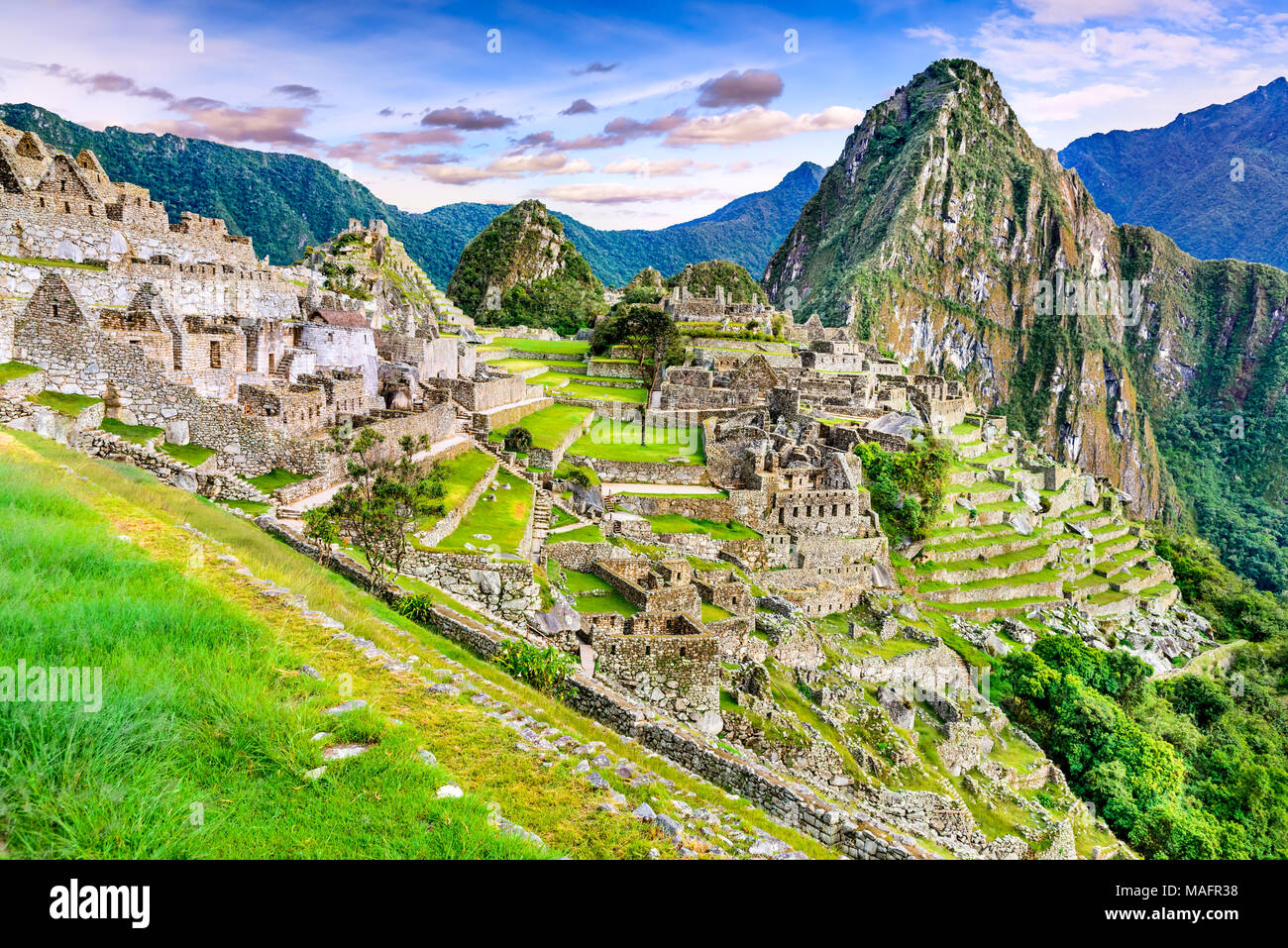 Machu Picchu in Peru - Ruins of Inca Empire city and Huaynapicchu Mountain in Sacred Valley, Cusco, South America. Stock Photo