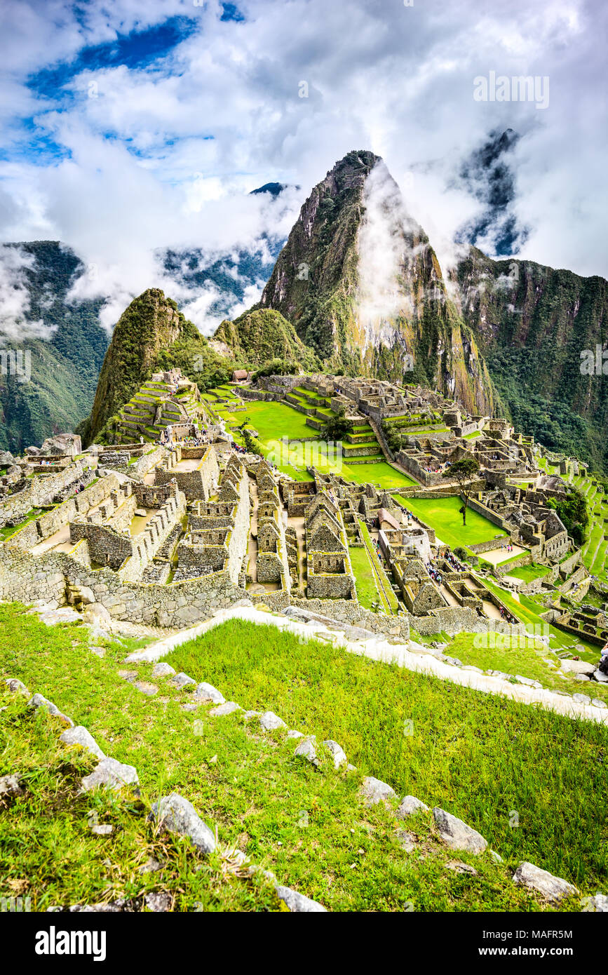 Machu Picchu in Peru - Ruins of Inca Empire city and Huaynapicchu Mountain in Sacred Valley, Cusco, South America. Stock Photo