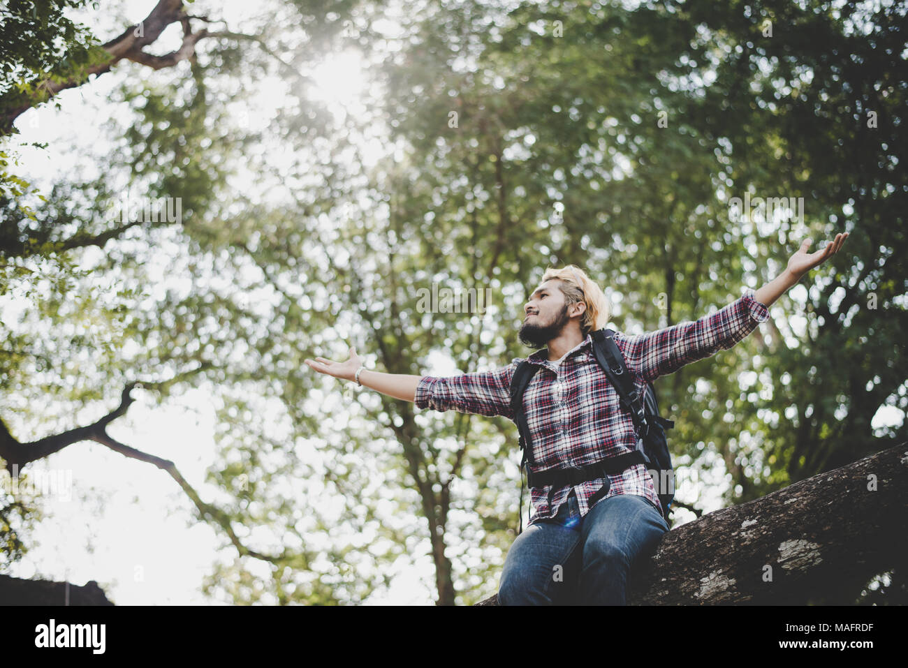 Female hiker sitting branch hi-res stock photography and images - Alamy