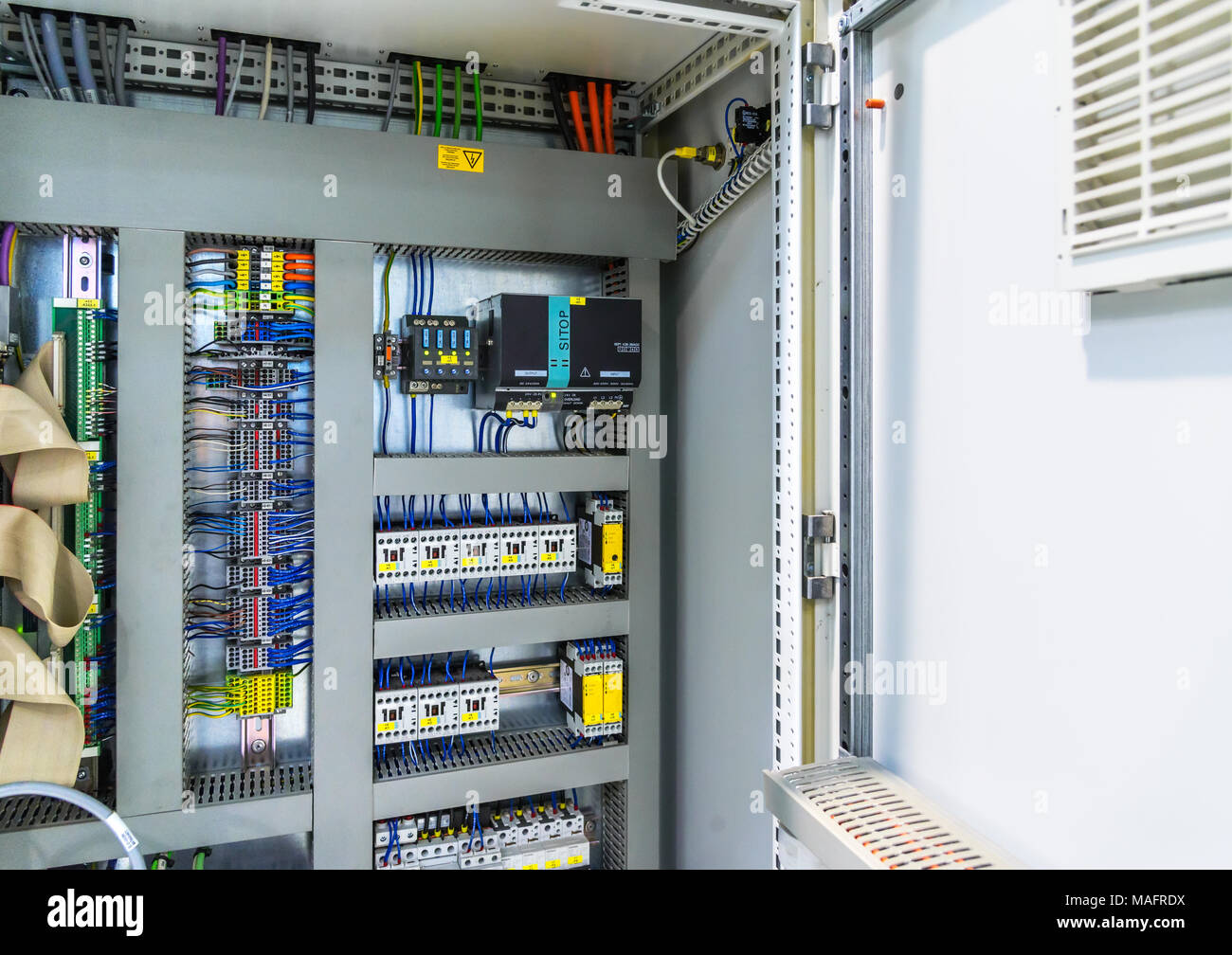 Automatic fuse electrical connector in power lines. Industrial electric enclosure, switch