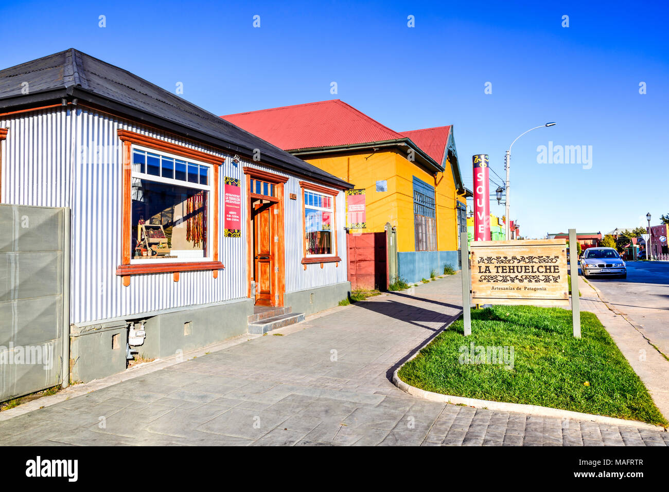 Puerto Natales, Chile - April 2017: Urban scene of Puerto Natales, south Patagonia city, main gate to Torres del Paine national landmark. Stock Photo