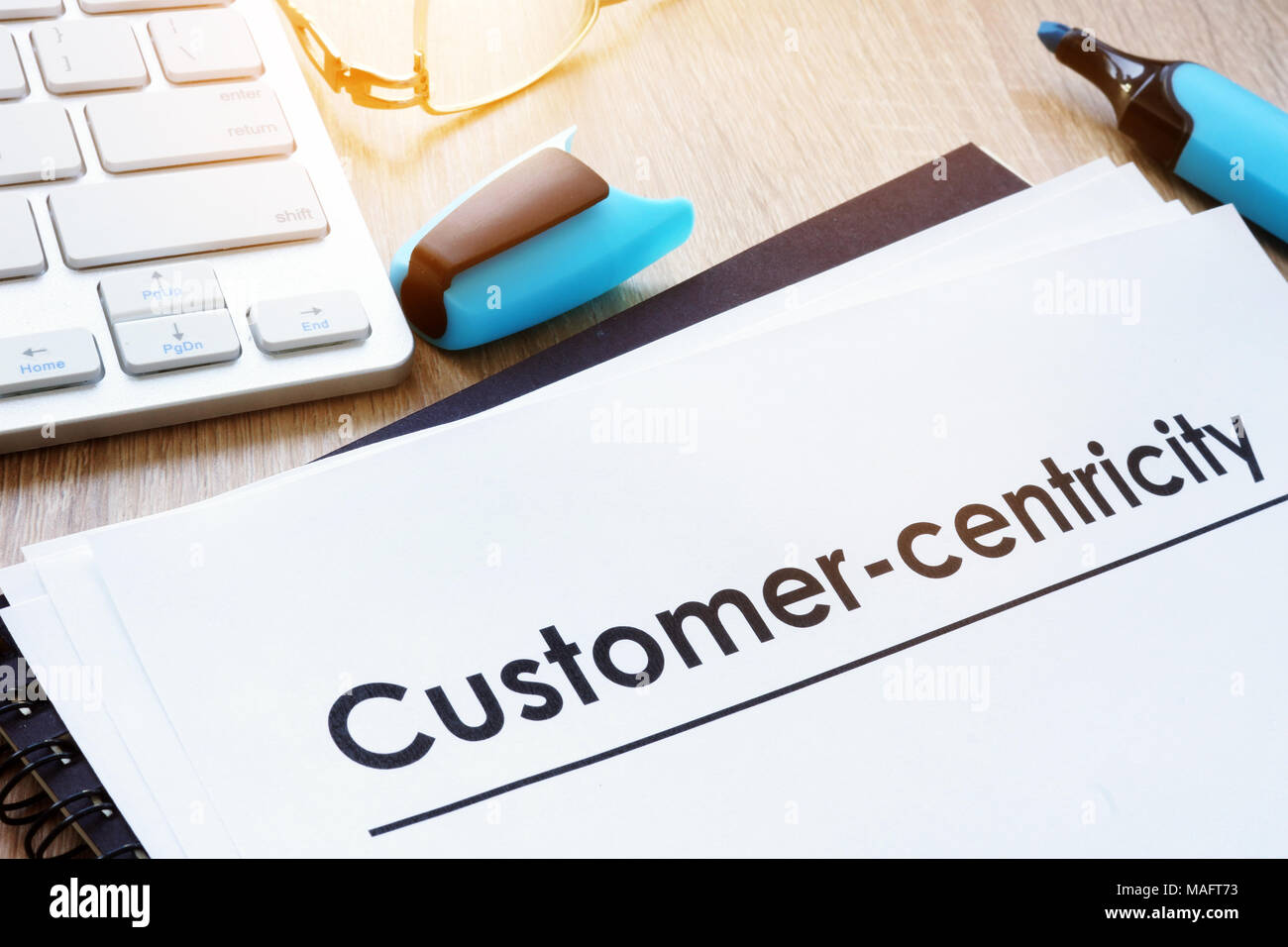 Customer in focus concept. Papers about Customer-centricity. Stock Photo