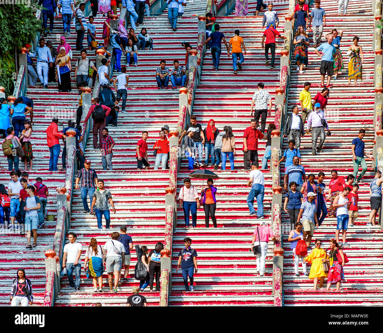 Kuala Lumpur, Malaysia, Batu Caves, 2018-02-16:  People move up stairs to visit sightseeing, concept of tourism and curiosity. Stock Photo