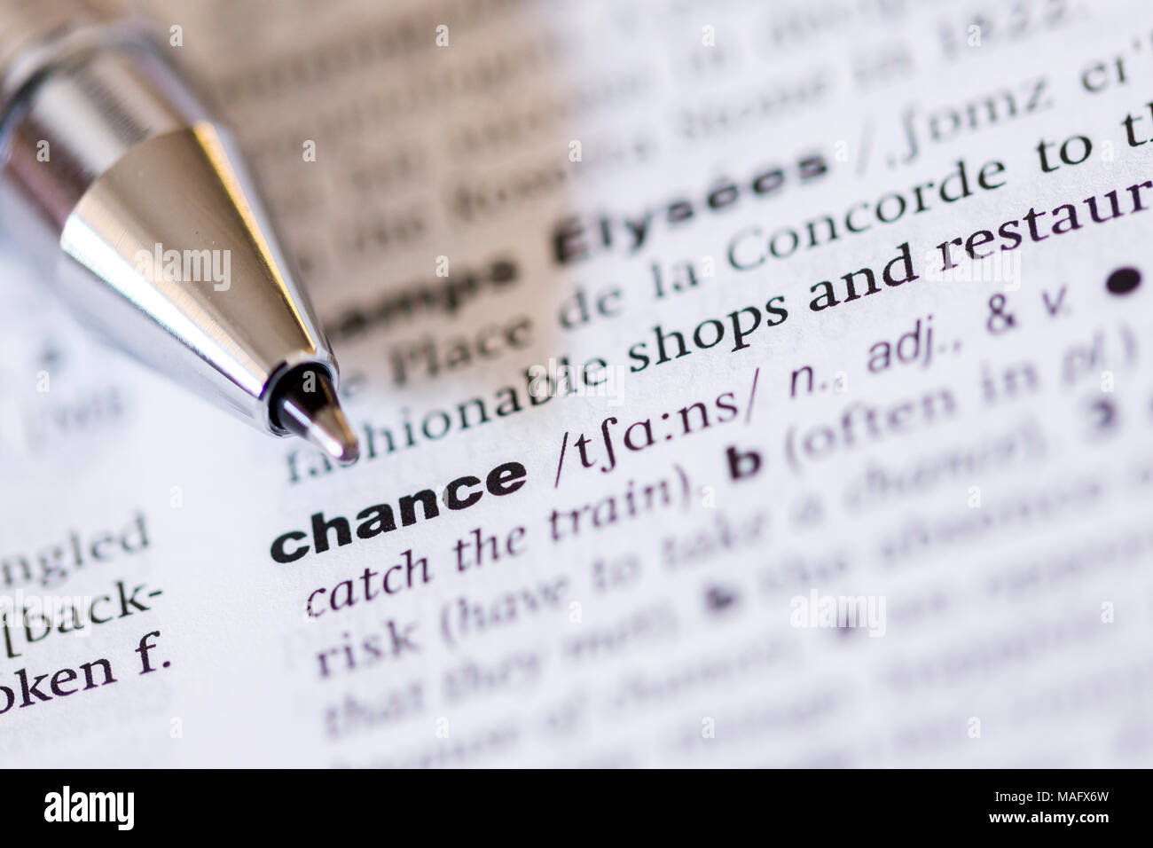 A macro shot showing the definition of the word chance in an English dictionary Stock Photo