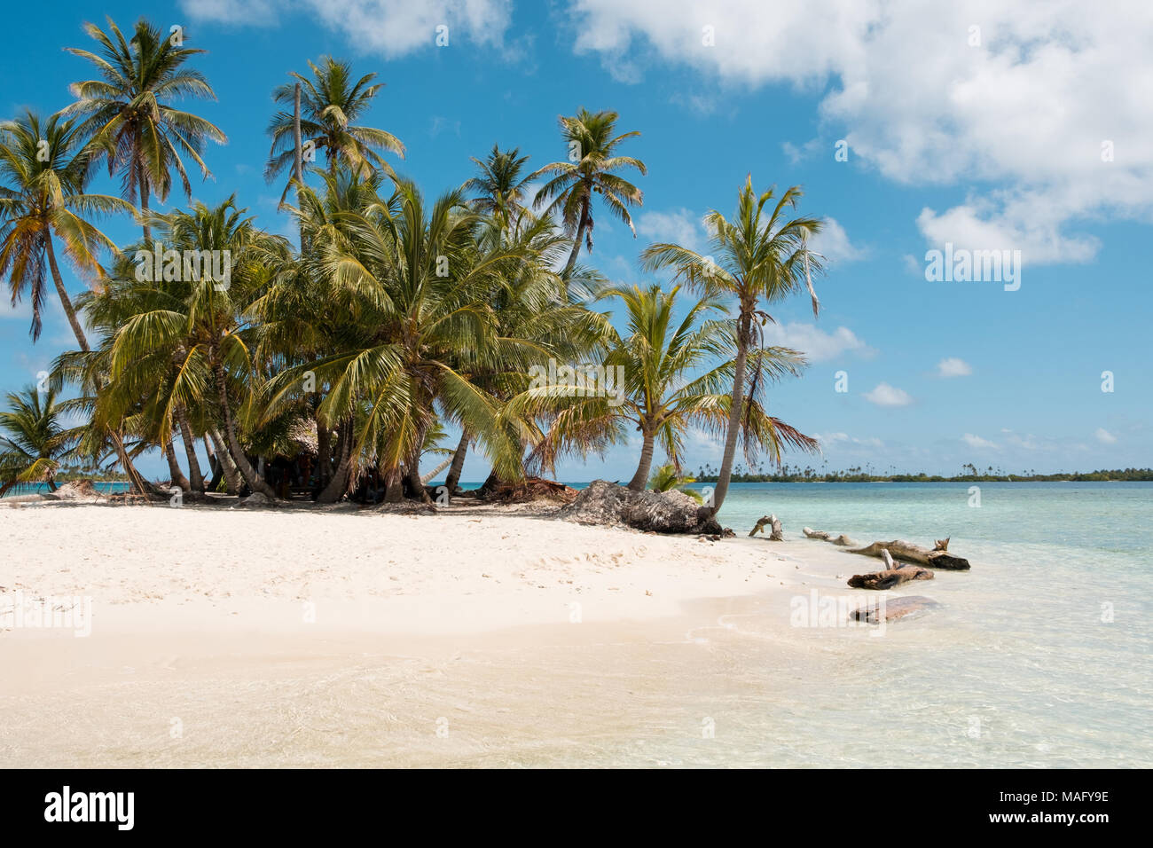 Small Island with palm trees and white sand beach , San Blas Islands - Stock Photo