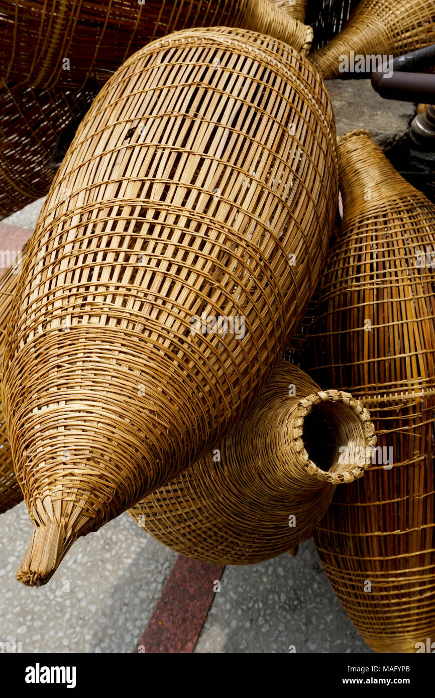 Bamboo fish traps being sold in Vietnam (Ho chi Minh City). Used for  shallow water fishing Stock Photo - Alamy