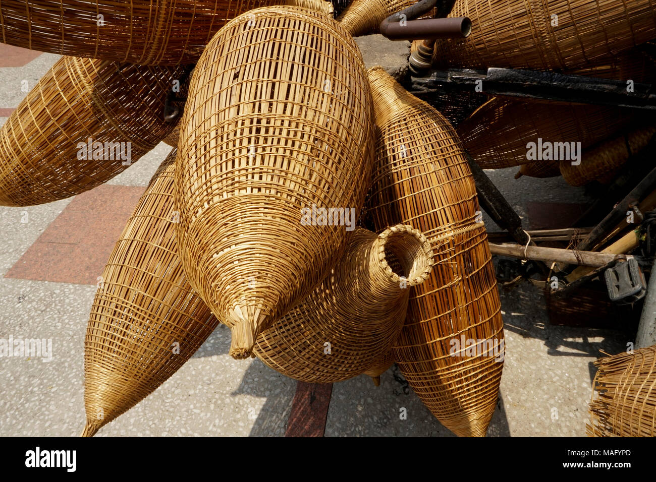 Bamboo fish traps being sold in Vietnam (Ho chi Minh City). Used for  shallow water fishing Stock Photo - Alamy