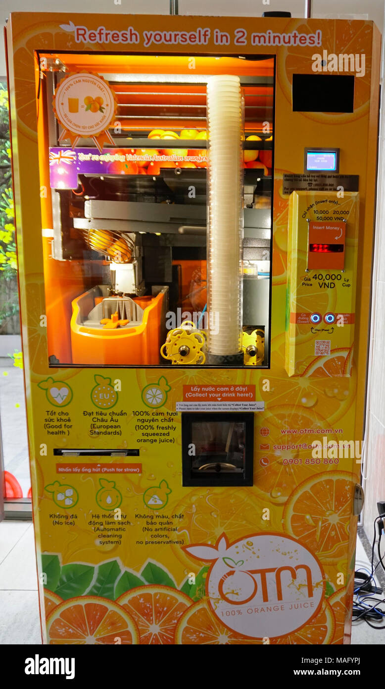Fresh Orange juice vending machine, Vietnam Stock Photo - Alamy