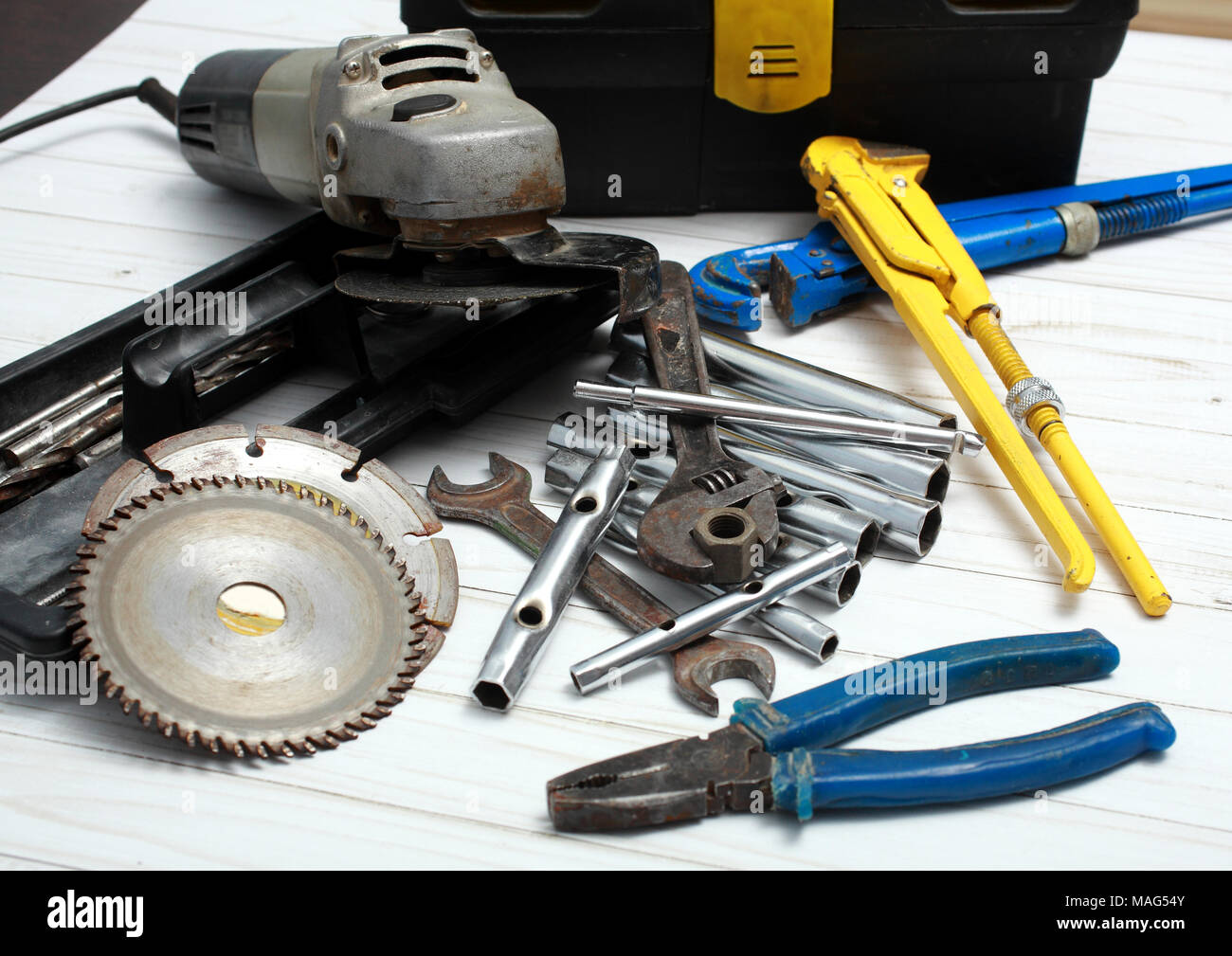 Collection of old tools for repair of household equipment and sanitary ware. Stock Photo