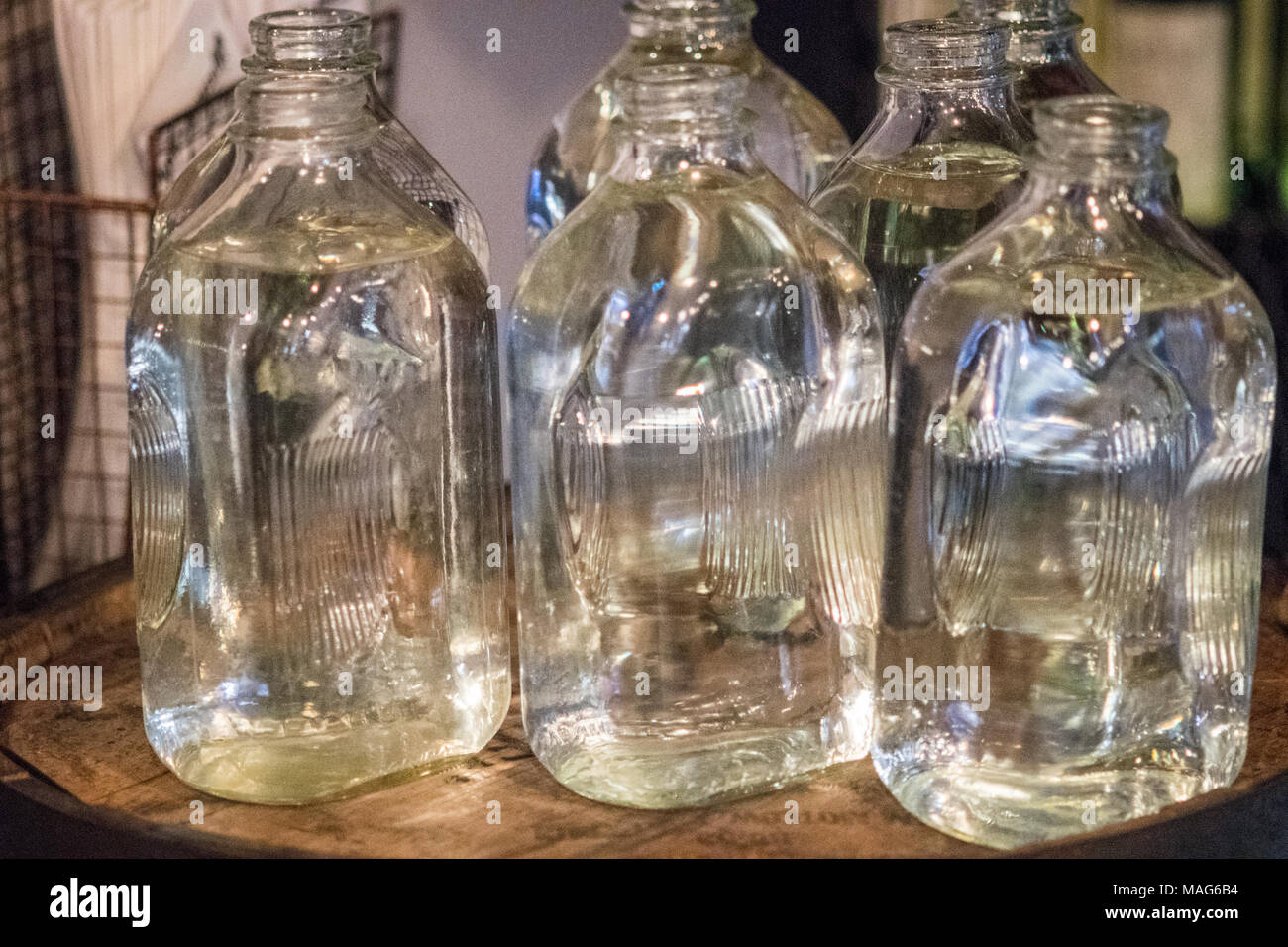 Jugs of moonshine at a restaurant in Baltimore, MD Stock Photo - Alamy