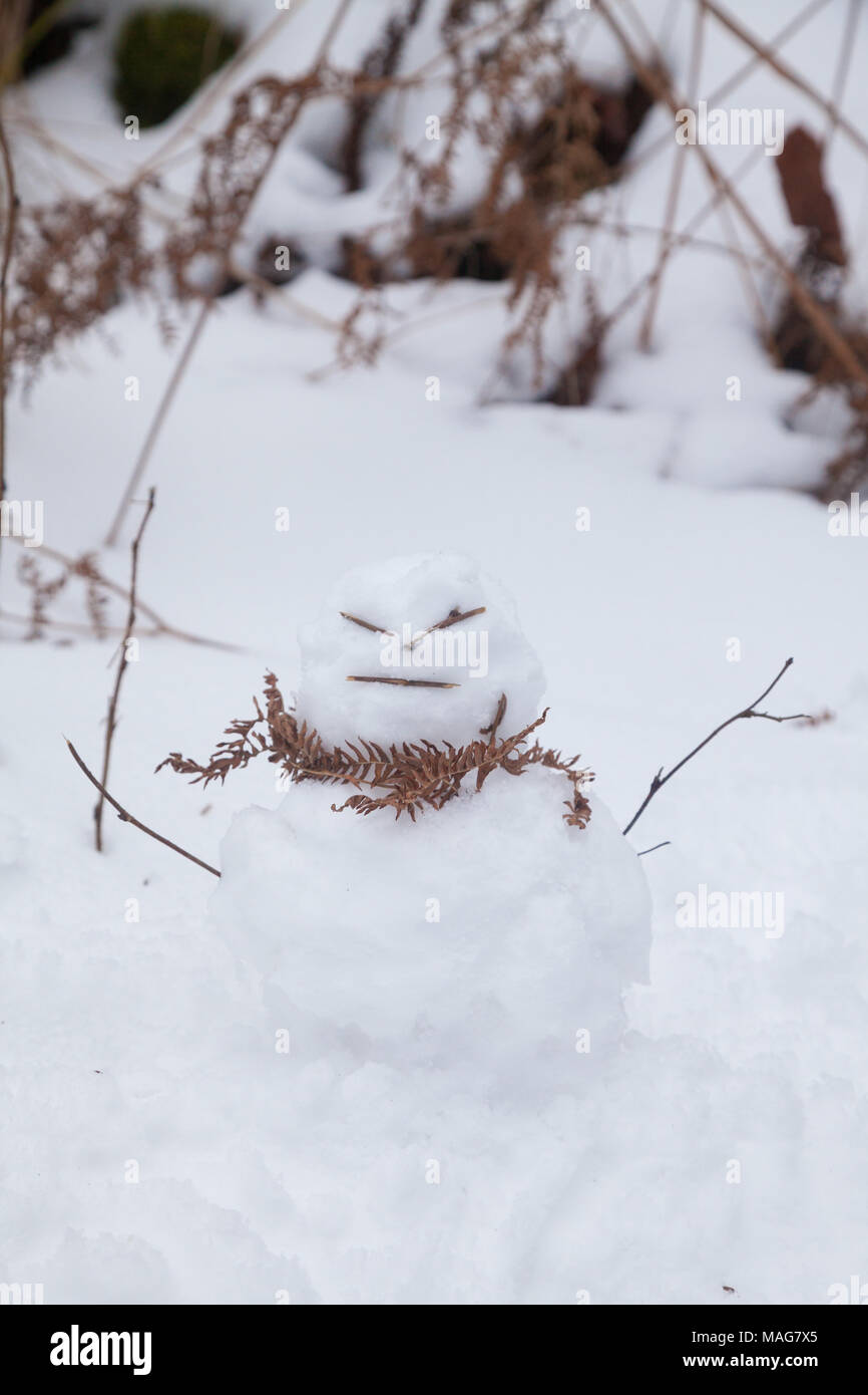 Evil looking miniature snowman in Dalgety Bay Fife Scotland Stock Photo