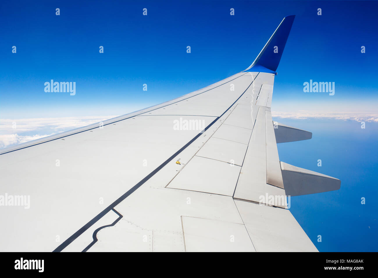 Airplane wing above sea white hi-res stock photography and images - Alamy