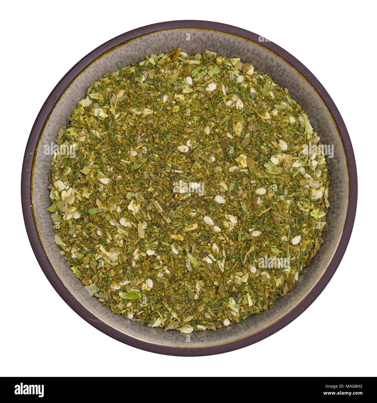 Bio organic falafel spice mix in ceramic bowl isolated on white ...