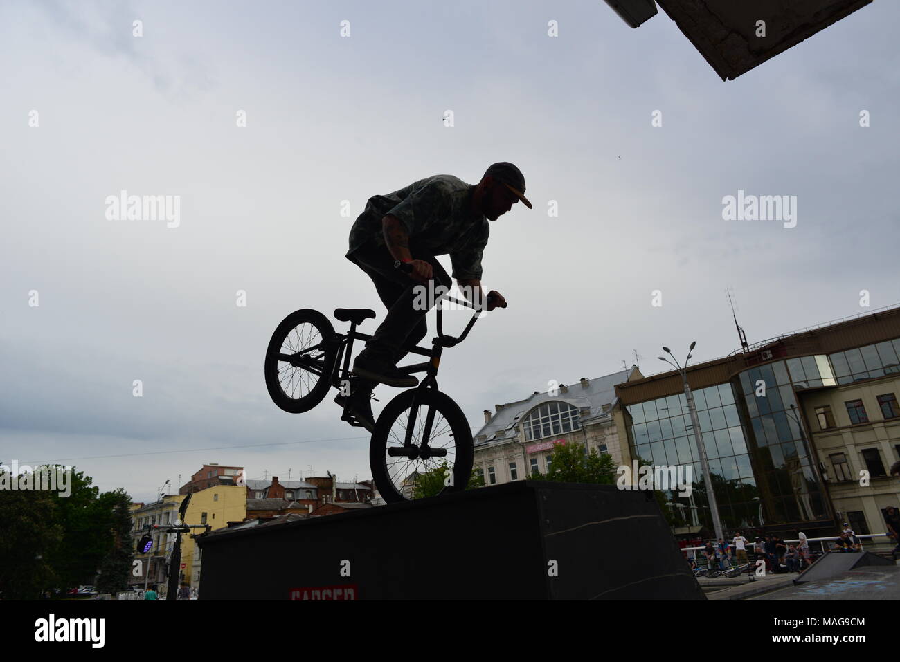 Young extremal bikers in the competition, near the Opera Theatre, Kharkiv, Ukraine Stock Photo