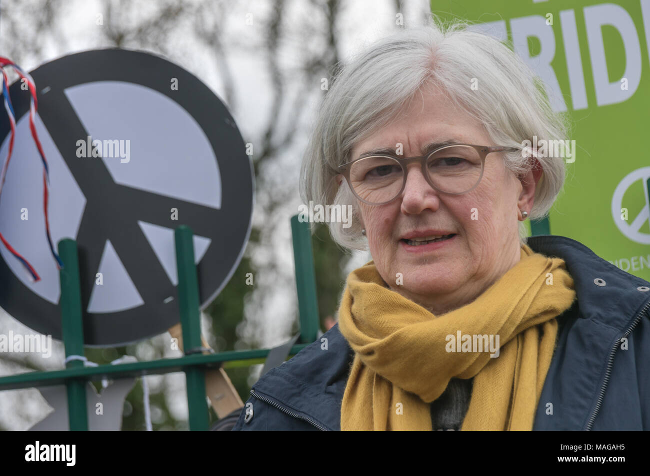 Aldermaston, UK. 1st Apr, 2018. Carol Turner, CND Vice-Chair, at the celebration of the 60th anniversary of the first Aldermaston march which mobilised thousands against the Bomb and shaped radical protest for generations. Their protest outside the Atomic Weapons Establishment included a giant, iconic peace symbol, speeches, including by some of those on the original march, singing and drumming and celebrated the UN treaty banning nuclear weapons. Campaign to abolish nuclear weapons. Credit: Peter Marshall/Alamy Live News Stock Photo